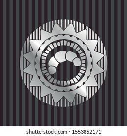croissant icon inside silver badge or emblem