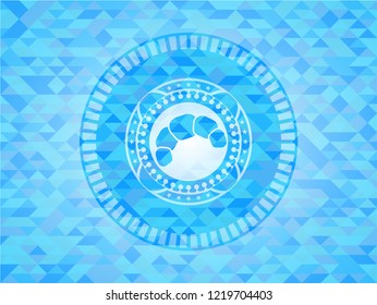 croissant icon inside sky blue emblem. Mosaic background