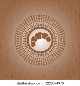 croissant icon inside wooden signboards