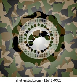 croissant icon on camouflaged pattern