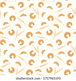 Croissants, bagels and spikelets on a beige background. Fresh pastry. Vector seamless pattern for bakeries, store, cafe, printing on packaging, wrapper, paper, fabric, textile, menu. Design template