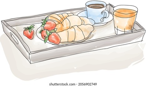 croissants with coffee, orange juice and strawberries. breakfast served on a tray to bed