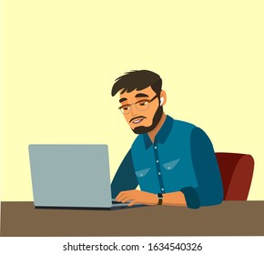 Cropped image of a young man working on his laptop busy using laptop at office desk. young male student typing on computer sitting at wooden table
