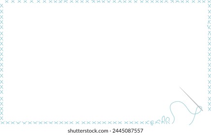 
Cross stitch frame with needle and light blue thread