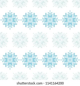 Cross stitch Norwegian snowflakes. Seamless vector background. Folk motives. Winter pattern. Textile rapport.