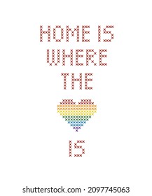 Cross stitch quote with rainbow heart. Home is where the heart is.