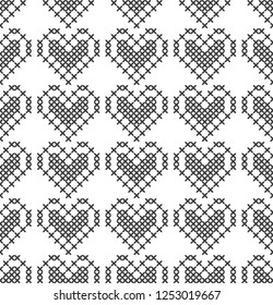Cross stitch, seamless decorative pattern with hearts. Embroidery and knitting. Abstract geometric background.