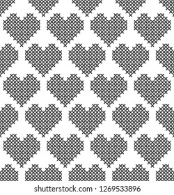Cross stitch, seamless decorative pattern with hearts. Embroidery and knitting. Abstract geometric background.