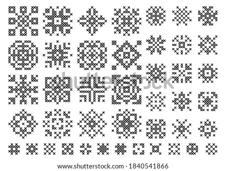 Cross stitch snowflake. Embroidery set of christmas elements. Holiday cross-stitch vector . Ethnic scandinavian or slavic pattern.