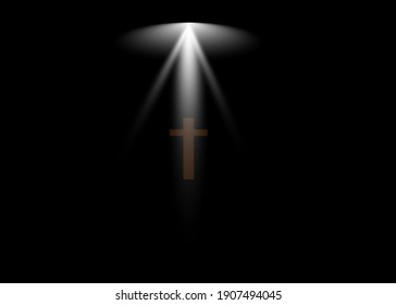 
cross under a ray of glory on a black background