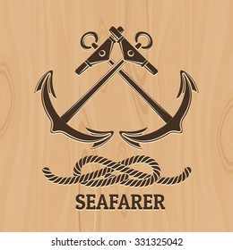Crossed Anchor and Rope Knot. Nautical emblem with lettering Seafarer. Illustration in Pyrography style. Free Font used.