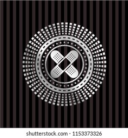 crossed band aids icon inside silvery badge