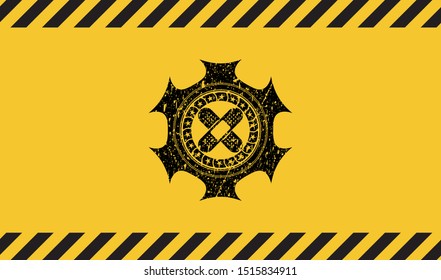 crossed bandage plaster icon black grunge emblem, yellow warning sign. Vector Illustration. Detailed.