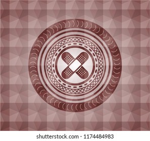 crossed bandage plaster icon inside red emblem or badge with abstract geometric polygonal pattern background. Seamless.