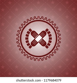 crossed bandage plaster icon inside vintage red emblem
