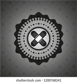 crossed bandage plaster icon inside realistic dark emblem