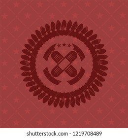crossed bandage plaster icon inside vintage red emblem