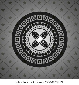 crossed bandage plaster icon inside black emblem. Vintage.