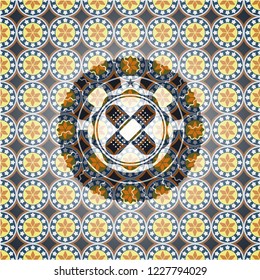 crossed bandage plaster icon inside arabic style emblem. Arabesque decoration.