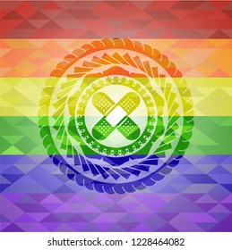 crossed bandage plaster icon inside emblem on mosaic background with the colors of the LGBT flag