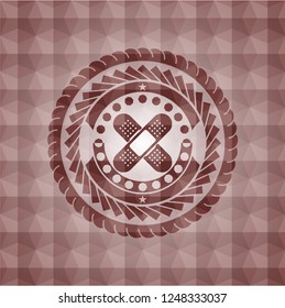 crossed bandage plaster icon inside red seamless geometric pattern emblem. Seamless.