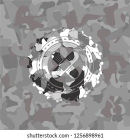 Crossed Bandage Plaster Icon Inside Grey Camo Texture