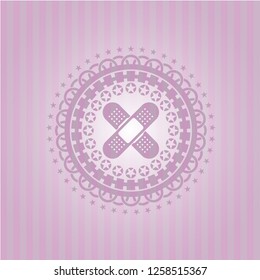 crossed bandage plaster icon inside realistic pink emblem