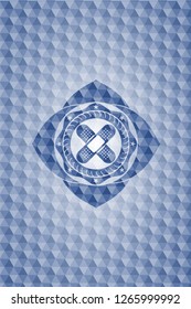 crossed bandage plaster icon inside blue badge with geometric background.