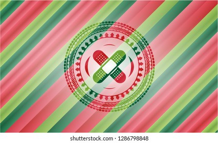 crossed bandage plaster icon inside christmas colors emblem.