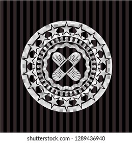 crossed bandage plaster icon inside silver badge