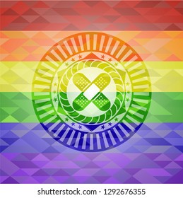 crossed bandage plaster icon inside emblem on mosaic background with the colors of the LGBT flag