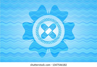 crossed bandage plaster icon inside water wave representation badge.
