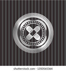 crossed bandage plaster icon inside silvery emblem