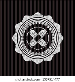 crossed bandage plaster icon inside silvery shiny emblem