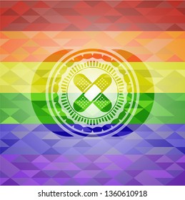 crossed bandage plaster icon inside emblem on mosaic background with the colors of the LGBT flag