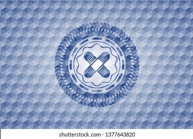 crossed bandage plaster icon inside blue emblem or badge with abstract geometric polygonal pattern background.