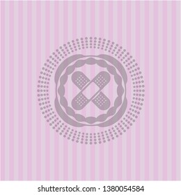 crossed bandage plaster icon inside retro pink emblem
