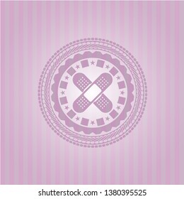 crossed bandage plaster icon inside pink emblem. Vintage.