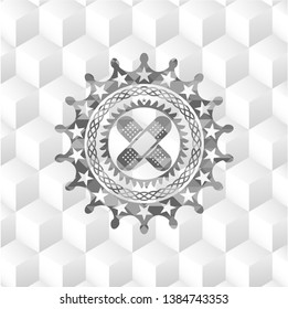crossed bandage plaster icon inside retro style grey emblem with geometric cube white background