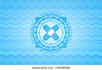 crossed bandage plaster icon inside light blue water wave badge background.