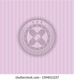 crossed bandage plaster icon inside vintage pink emblem