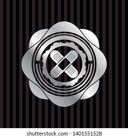 crossed bandage plaster icon inside silver badge or emblem