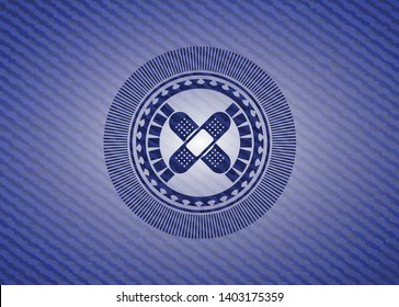 crossed bandage plaster icon inside jean background