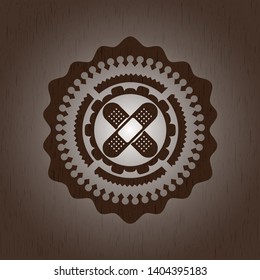 crossed bandage plaster icon inside wood signboards