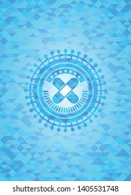 crossed bandage plaster icon inside sky blue emblem. Mosaic background