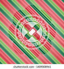 crossed bandage plaster icon inside christmas emblem.
