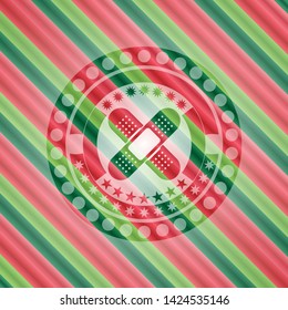 crossed bandage plaster icon inside christmas emblem.