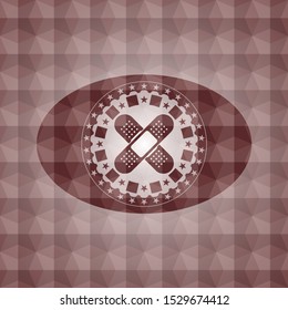 crossed bandage plaster icon inside red seamless emblem or badge with abstract geometric polygonal pattern background.