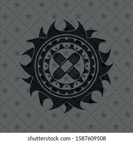 crossed bandage plaster icon inside realistic dark emblem