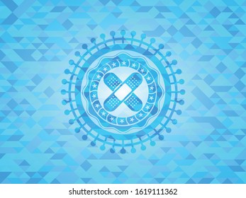 crossed bandage plaster icon inside realistic light blue emblem. Mosaic background